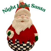 Load image into Gallery viewer, A decorated Christmas tree with lights and take-home craft kits sign text placed in front.
