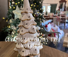 Load image into Gallery viewer, Ceramic Christmas tree on a table with a blurred festive background