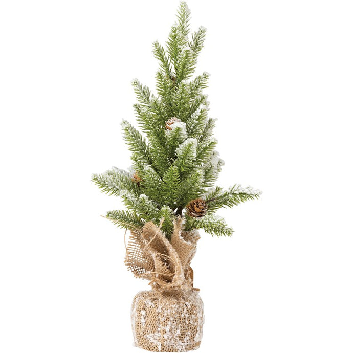 A standing bristle tree featuring flocked accents for a snowy effect. 16