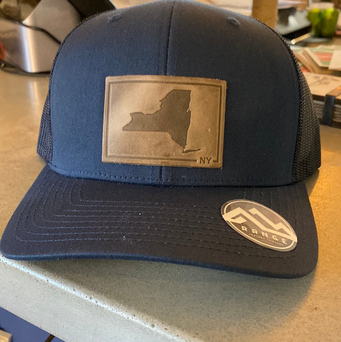 Trucker hat with leather badge with NY state by Range leather goods.   Sold At Miller's Crossing Design, Baldwinsville, NY