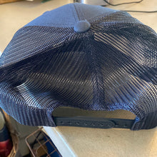Load image into Gallery viewer, Trucker hat with leather badge with NY state by Range leather goods.   Sold At Miller&#39;s Crossing Design, Baldwinsville, NY