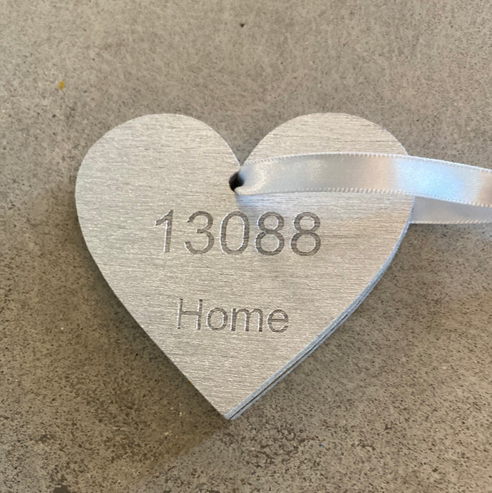 Silver handmade Liverpool zip code ornament. 